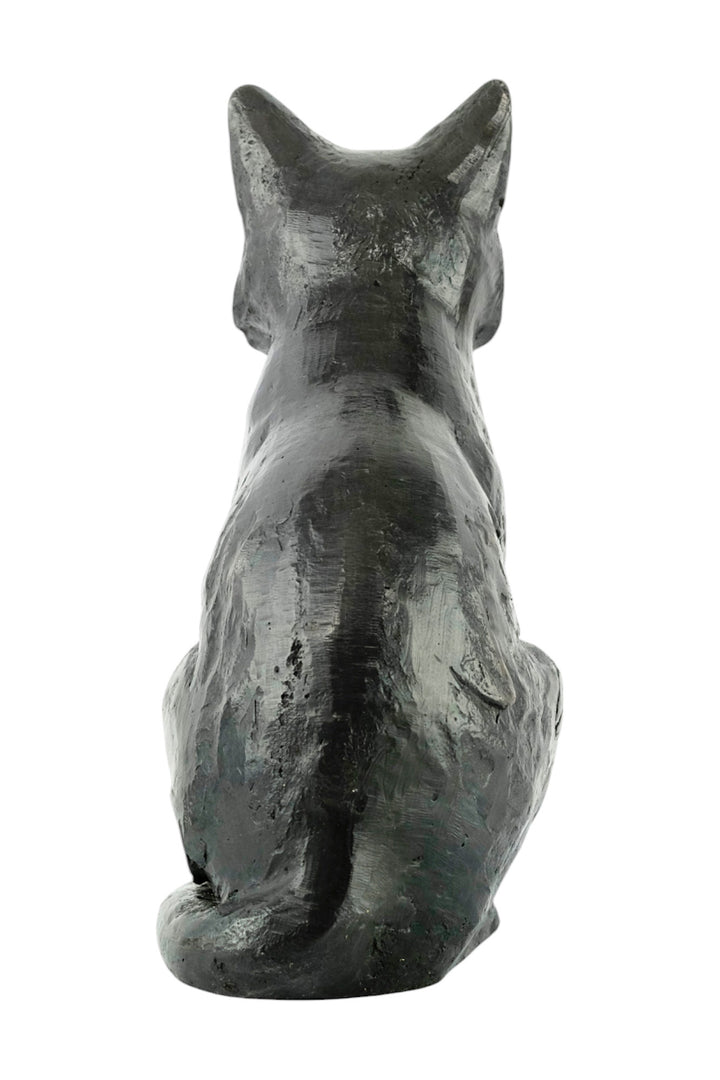 Bronze sculpture of a sitting cat