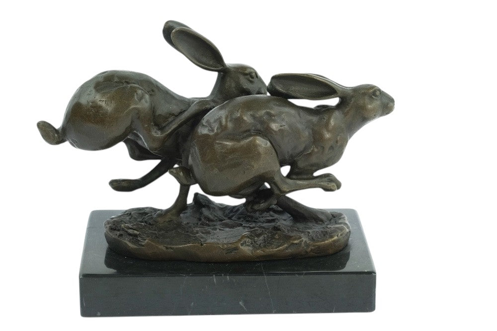 Bronze running hares sculpture