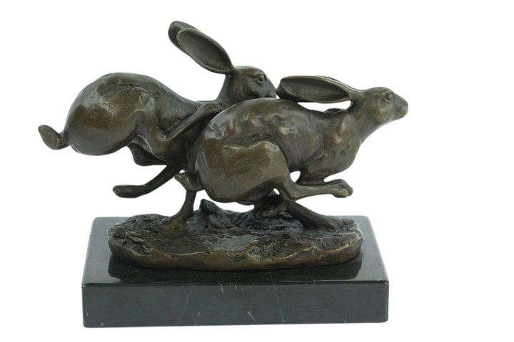 Bronze running hares sculpture