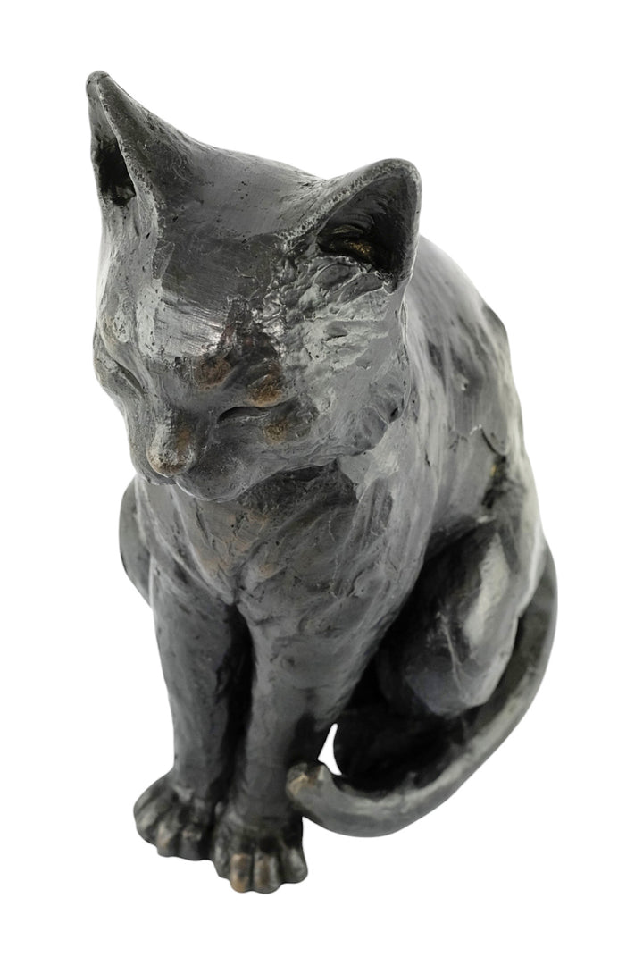 Bronze sculpture of a sitting cat