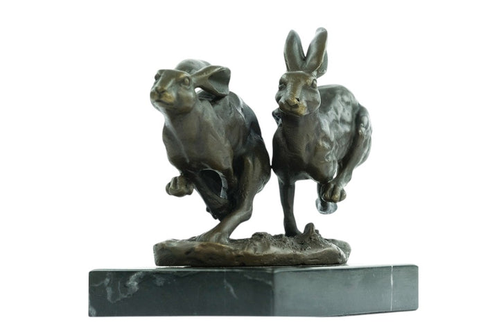 Bronze running hares sculpture