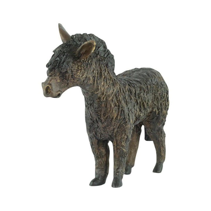 Bronze sculpture of a standing donkey blinded by it's coat hair