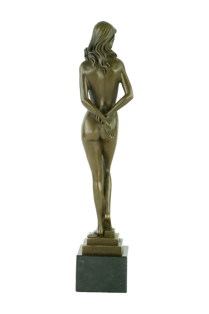 Bronze sculpture of a standing female nude