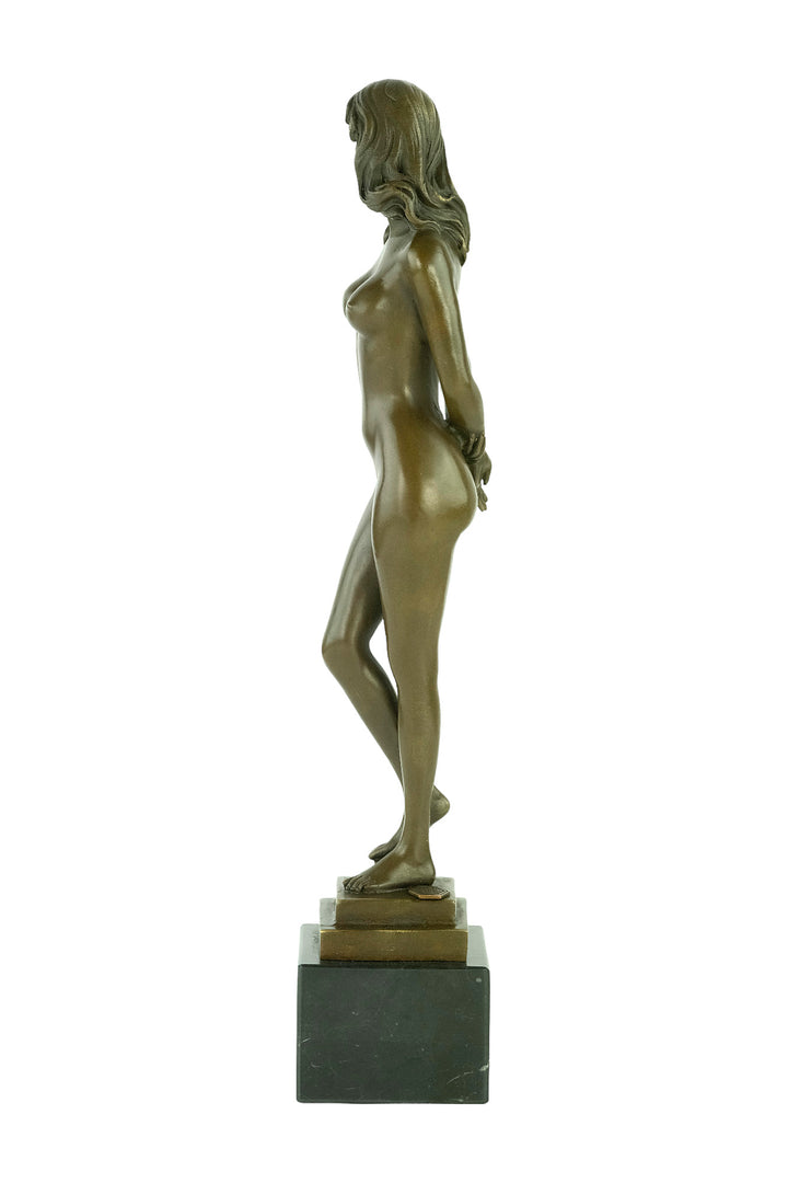 Bronze sculpture of a standing female nude