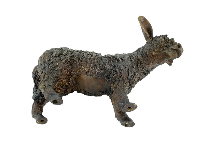 Bronze sculpture of a standing donkey blinded by it's coat hair