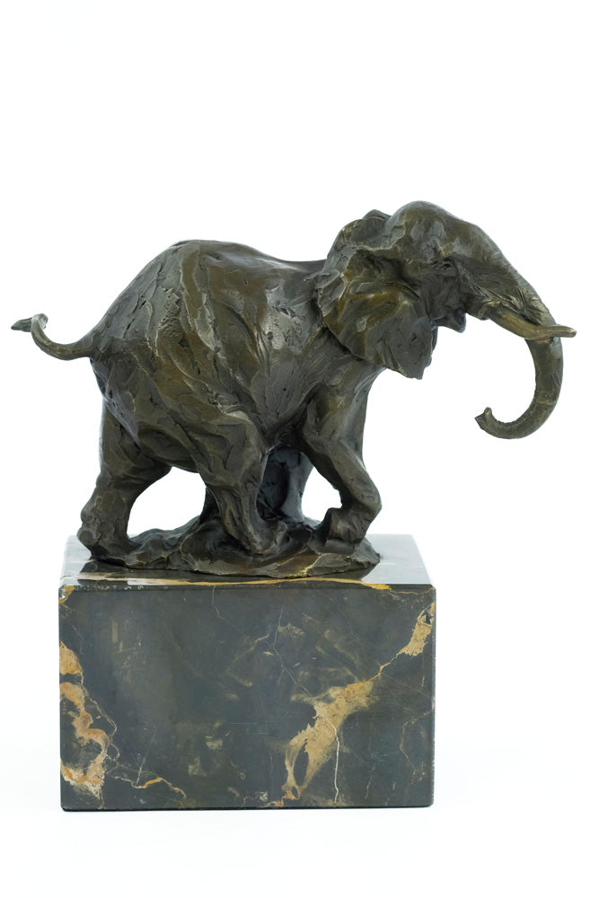 Bronze sculpture of a walking elephant
