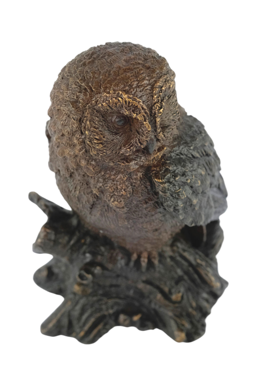 Bronze sculpture of a small own on a tree trunk