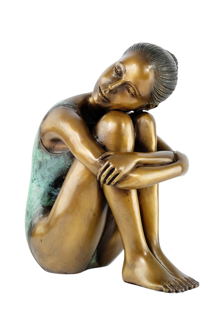 Bronze sculpture of a young girl in swimsuit resting her head