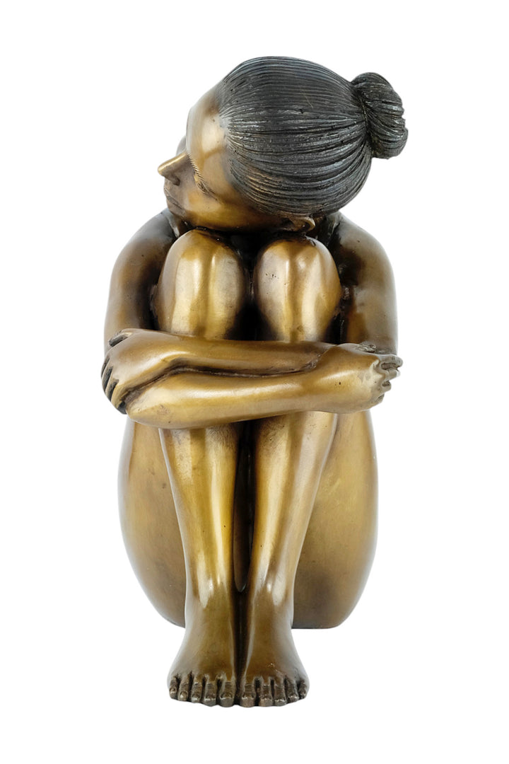 Bronze sculpture of a young girl in swimsuit resting her head