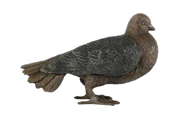 Bronze sculpture of a standing pigeon