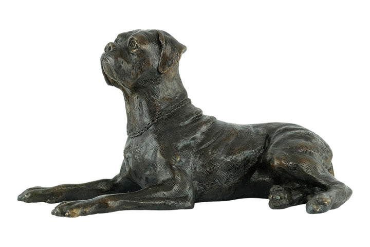 Bronze sculpture of a reclining boxer dog