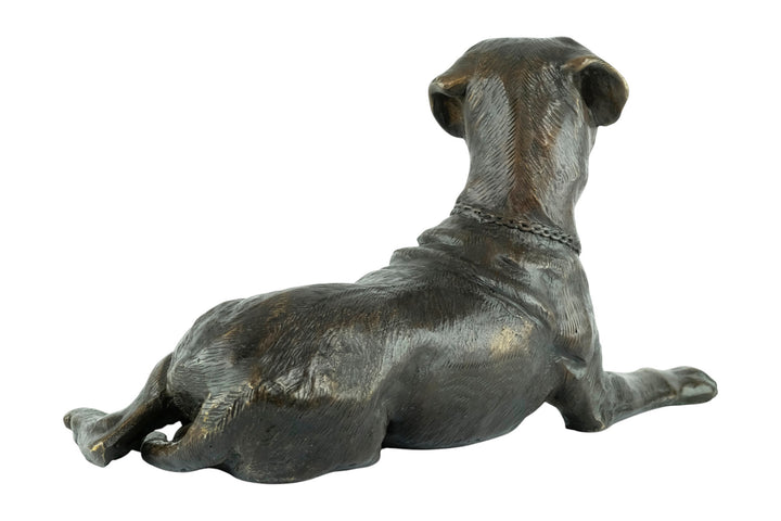 Bronze sculpture of a reclining boxer dog