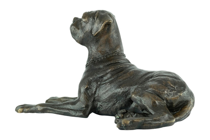 Bronze sculpture of a reclining boxer dog