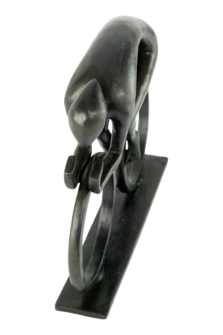 Modern bronze sculpture of a cyclist at full speed