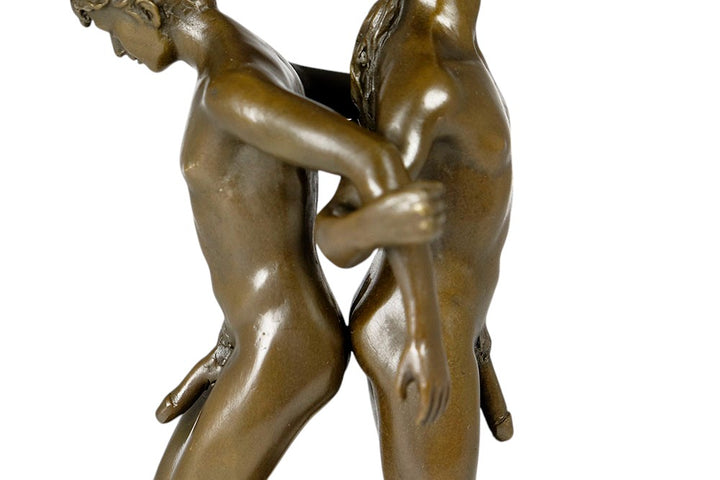 Bronze sculpture of a male couple standing back to back