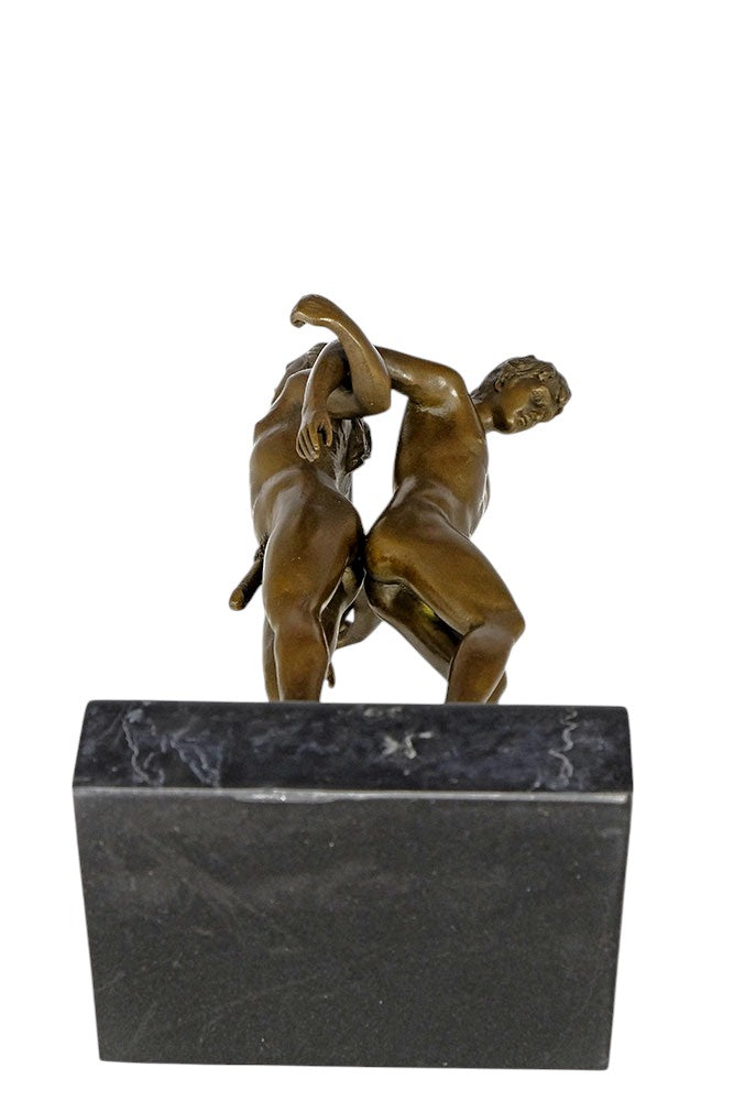 Bronze sculpture of a male couple standing back to back