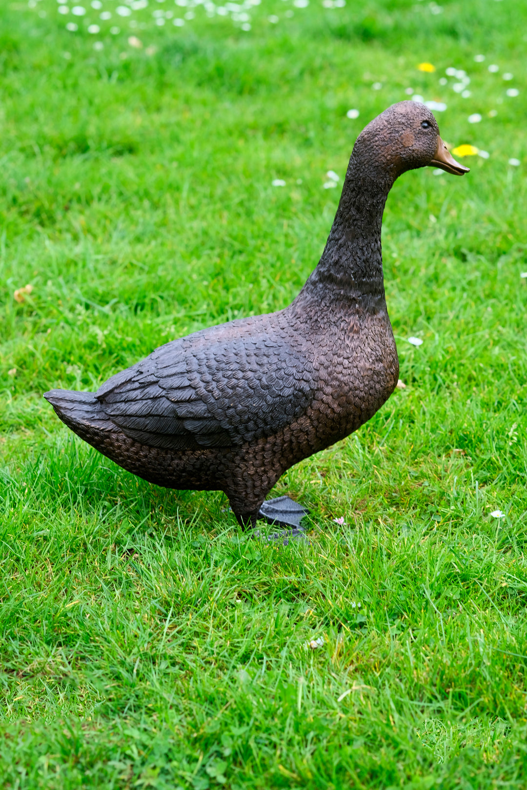 Large bronze sculpture of a standing duck