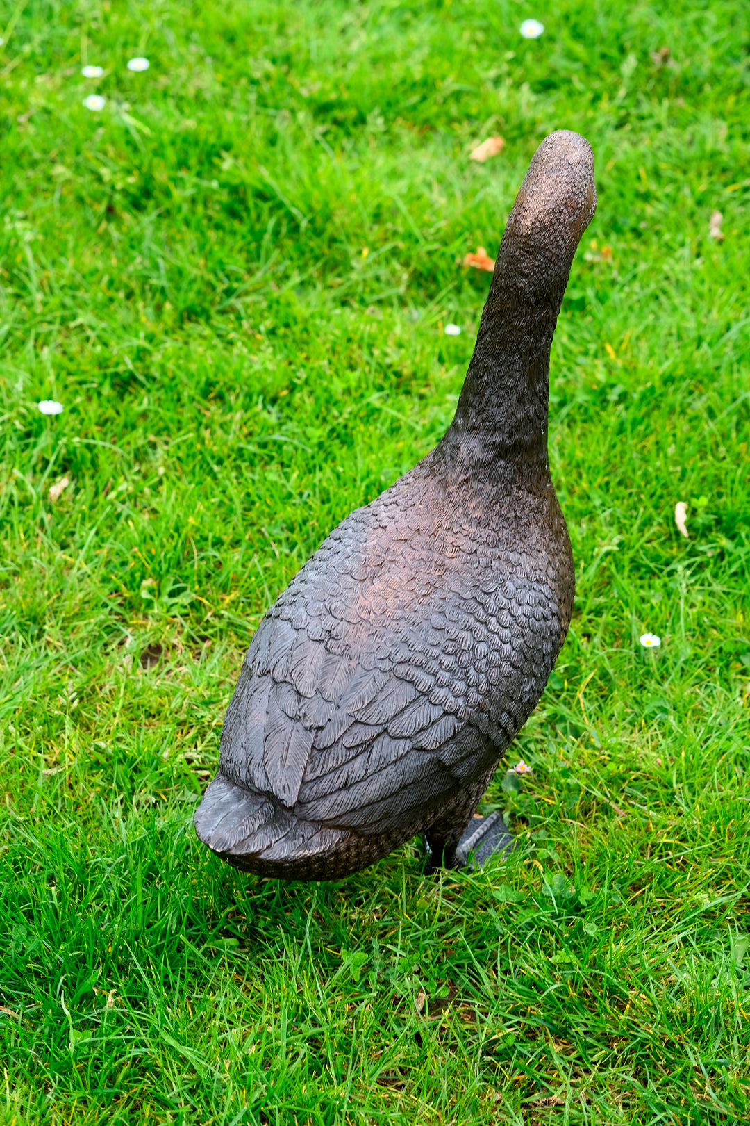 Large bronze sculpture of a standing duck