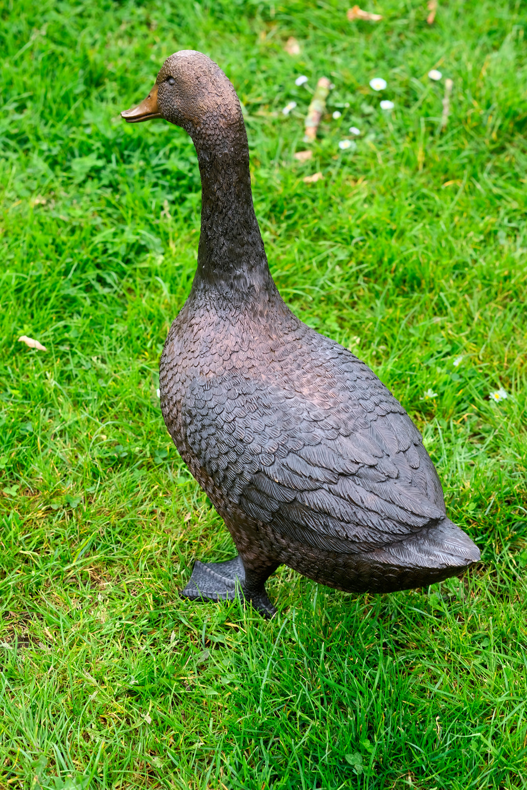 Large bronze sculpture of a standing duck