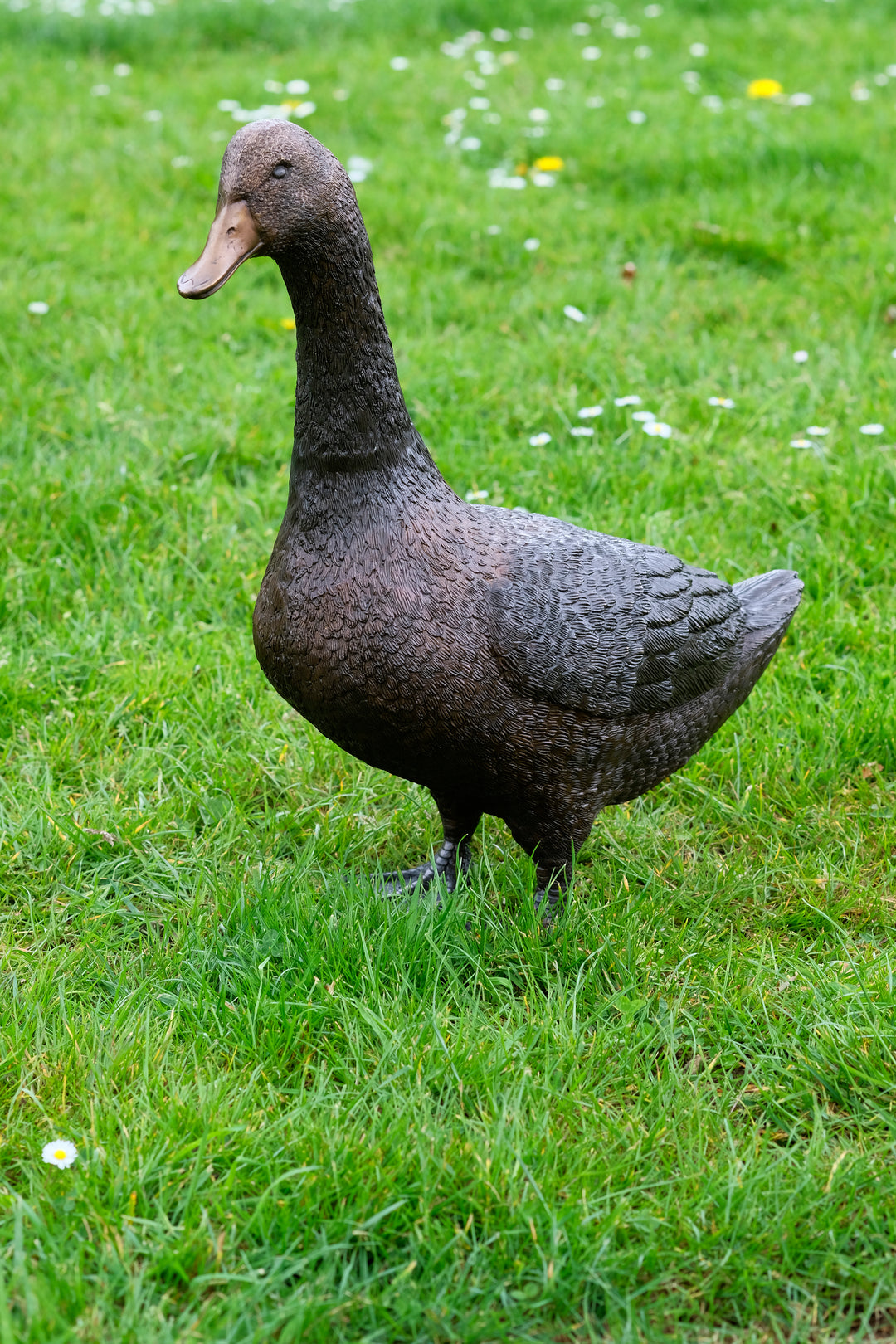 Large bronze sculpture of a standing duck