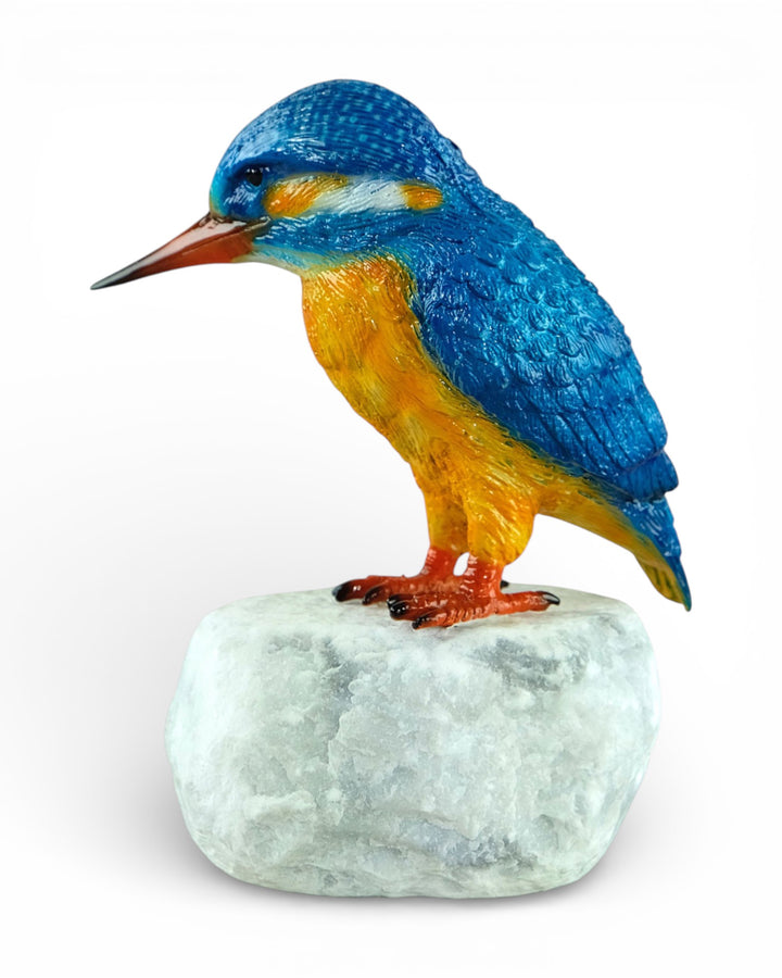 Painted bronze sculpture of a kingfisher on a rock