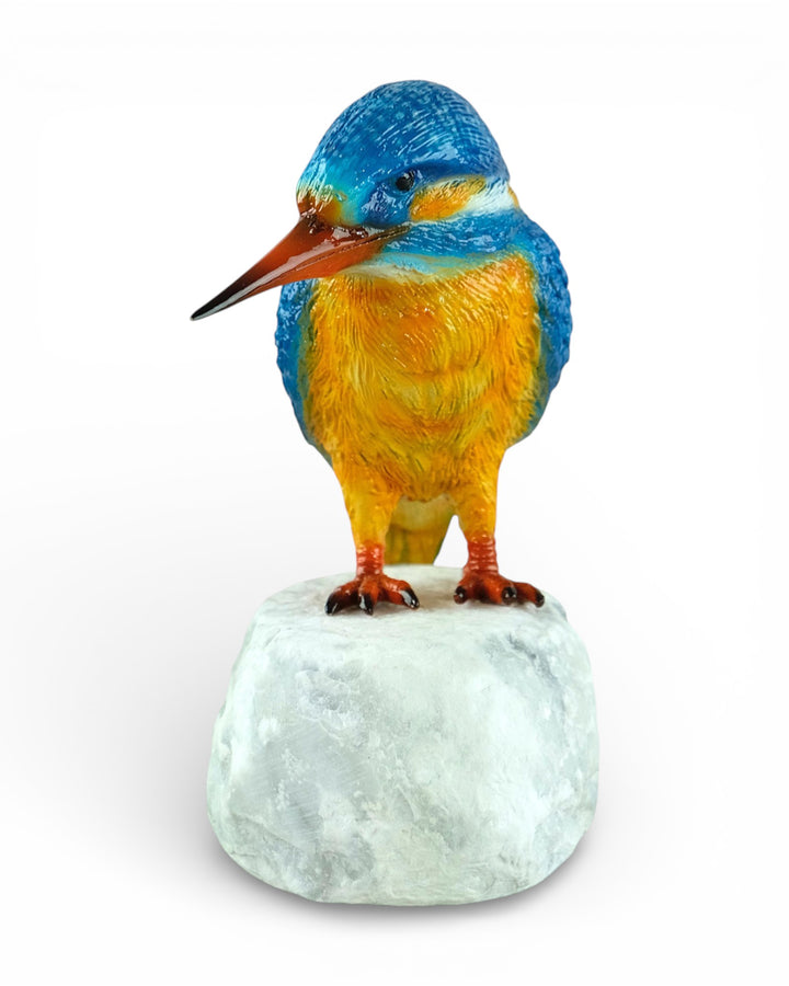 Painted bronze sculpture of a kingfisher on a rock