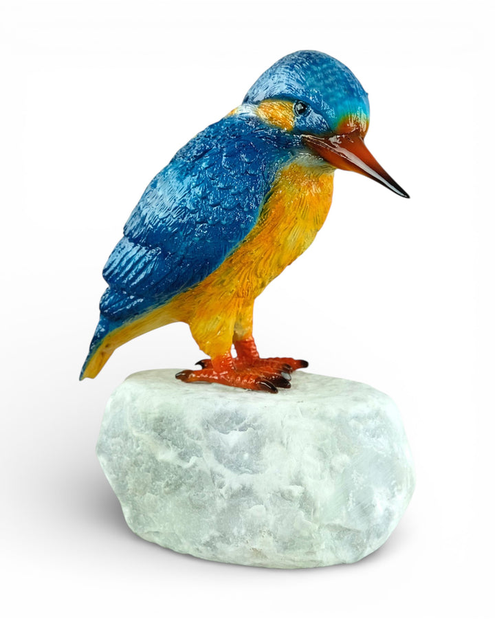 Painted bronze sculpture of a kingfisher on a rock