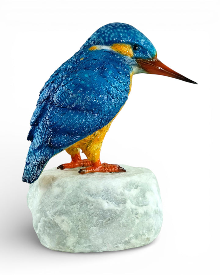 Painted bronze sculpture of a kingfisher on a rock
