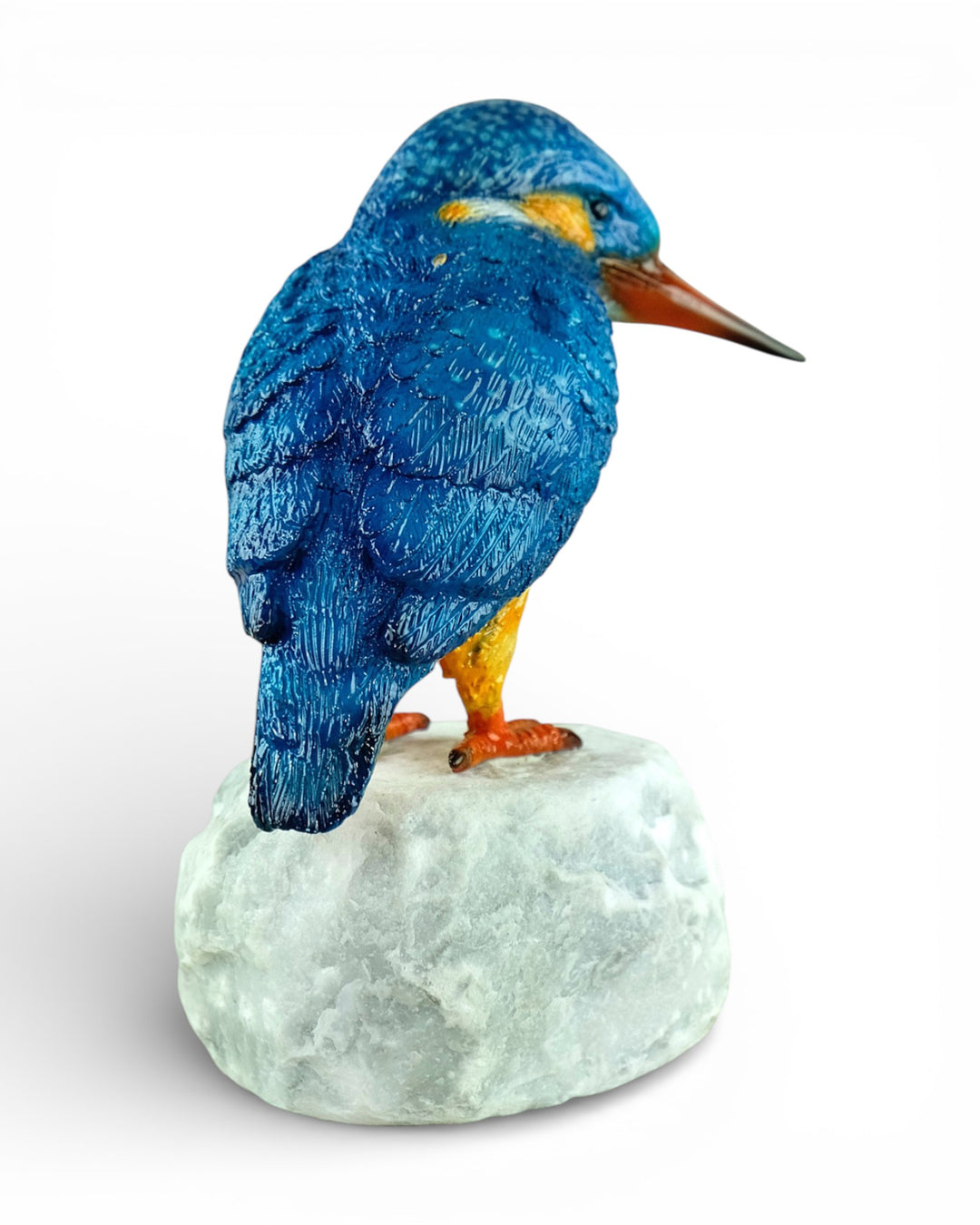 Painted bronze sculpture of a kingfisher on a rock