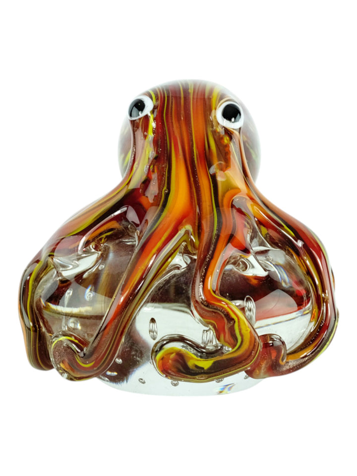 Sculpture en verre colorée d’une pieuvre aux tentacules ondulants