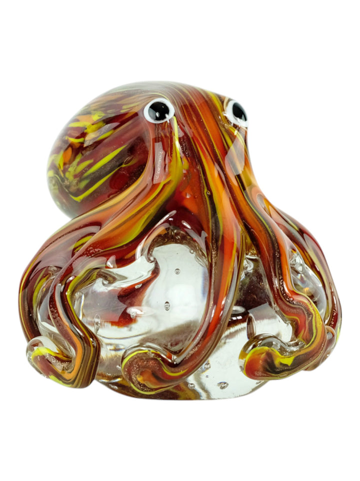Sculpture en verre colorée d’une pieuvre aux tentacules ondulants