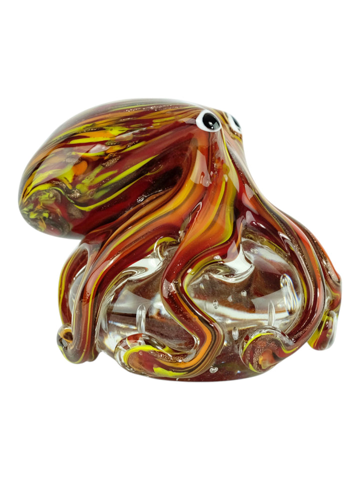 Sculpture en verre colorée d’une pieuvre aux tentacules ondulants