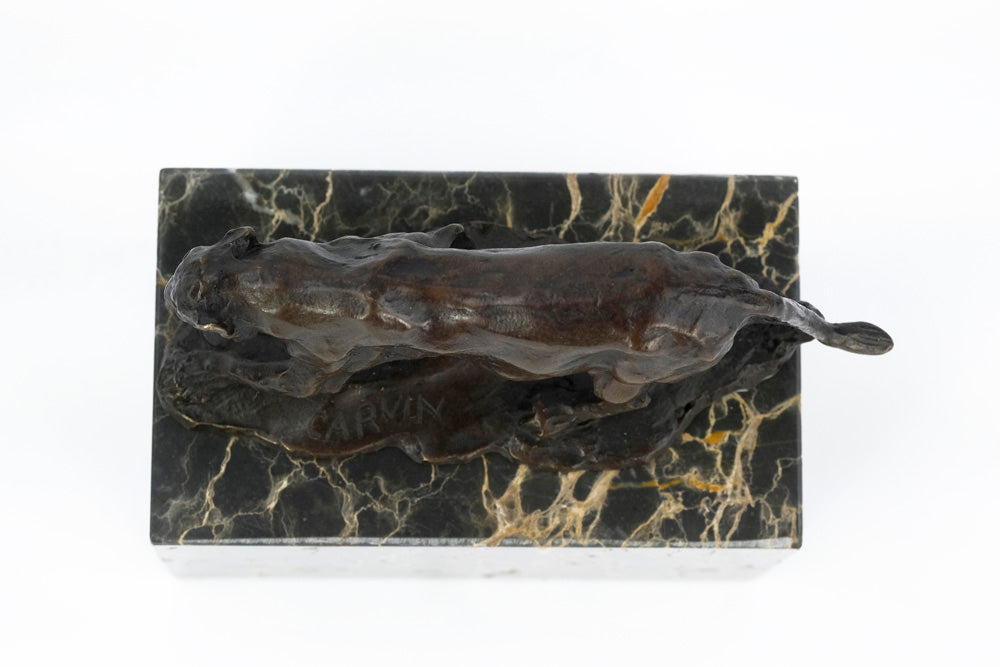 Bronze sculpture of a walking panther