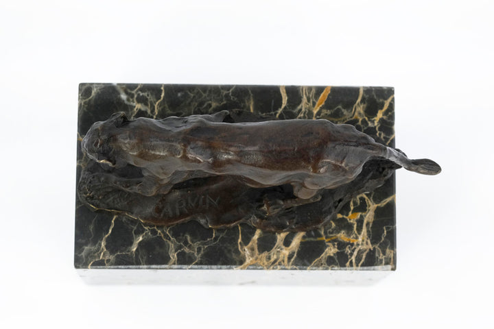 Bronze sculpture of a walking panther