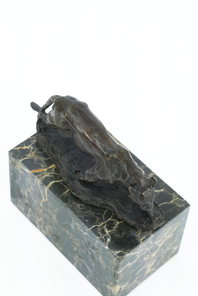 Bronze sculpture of a walking panther