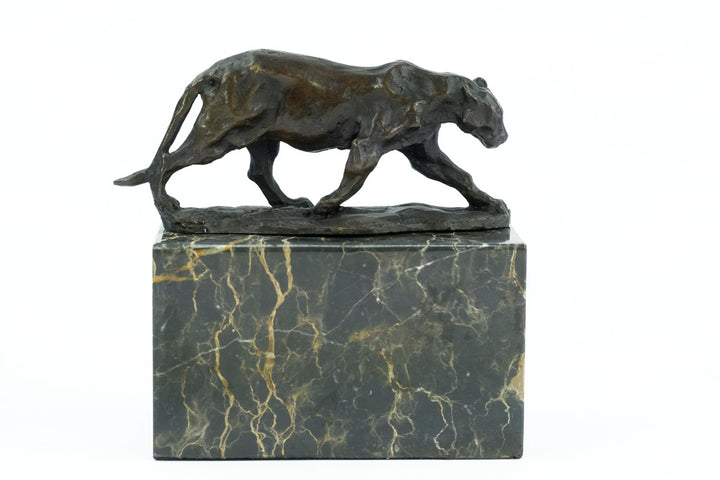 Bronze sculpture of a walking panther