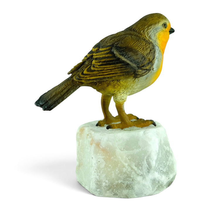 Scultura in bronzo raffigurante un pettirosso europeo su pietra naturale