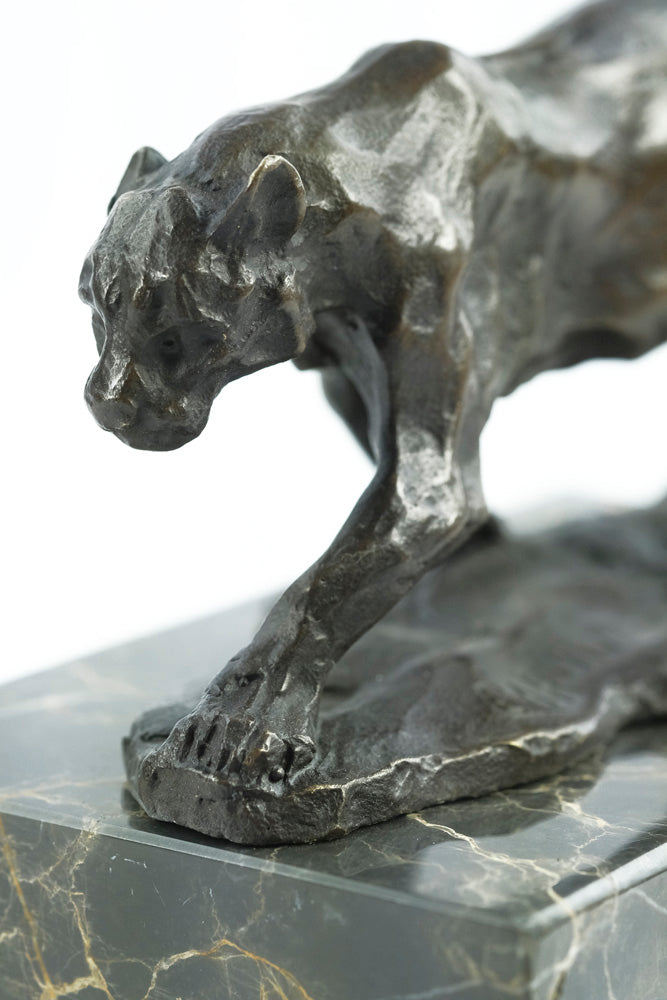 Bronze sculpture of a walking panther
