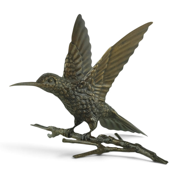 Bronze spiderhunter sculpture