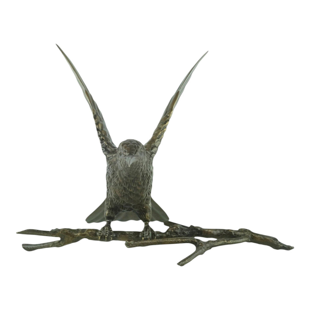 Bronze spiderhunter sculpture