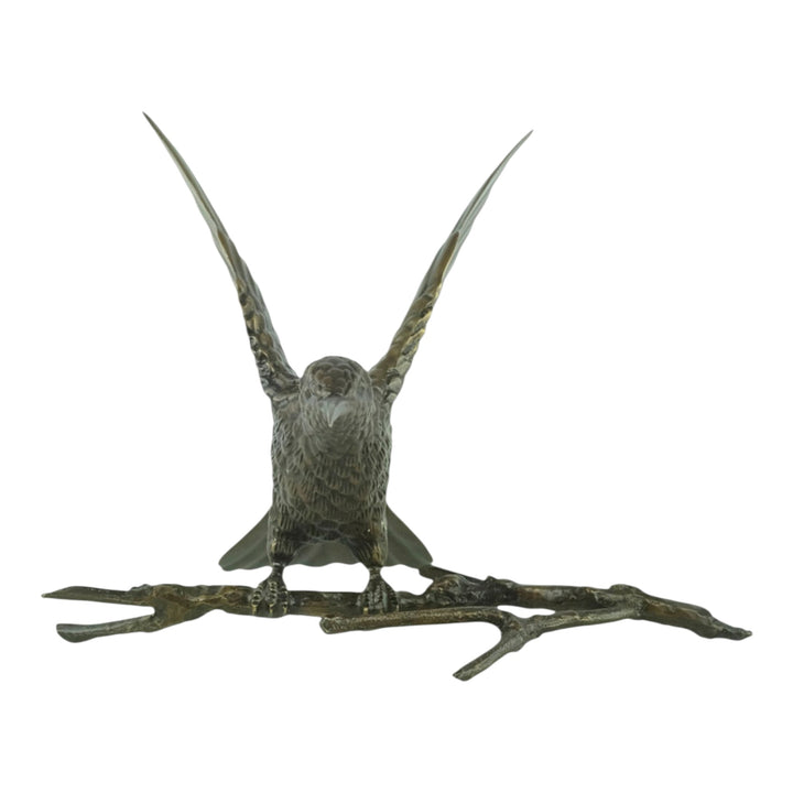 Bronze spiderhunter sculpture