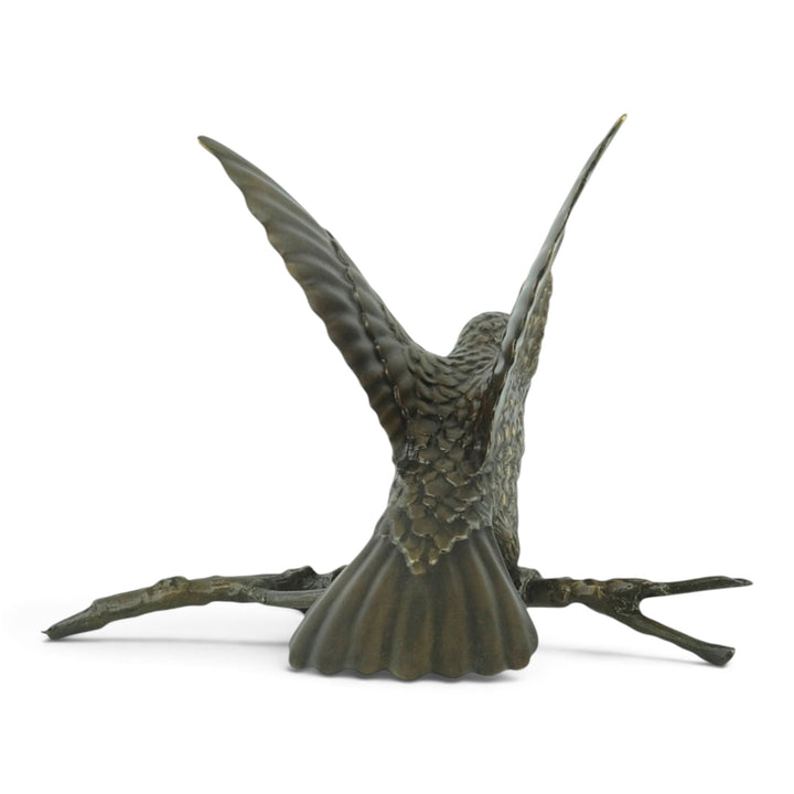 Bronze spiderhunter sculpture