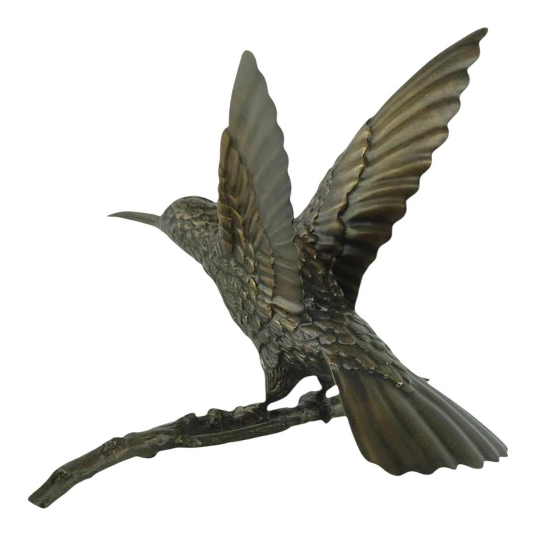 Bronze spiderhunter sculpture