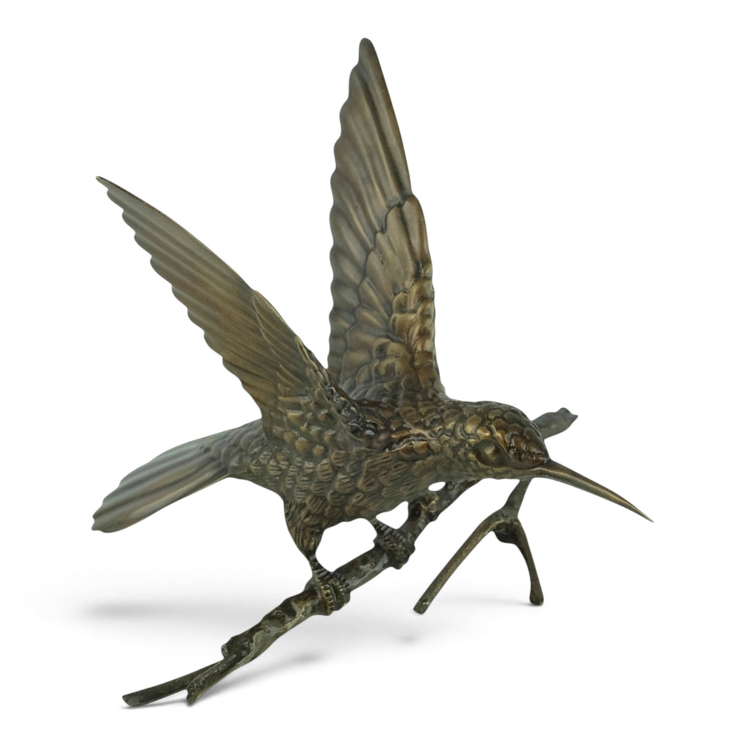 Bronze spiderhunter sculpture