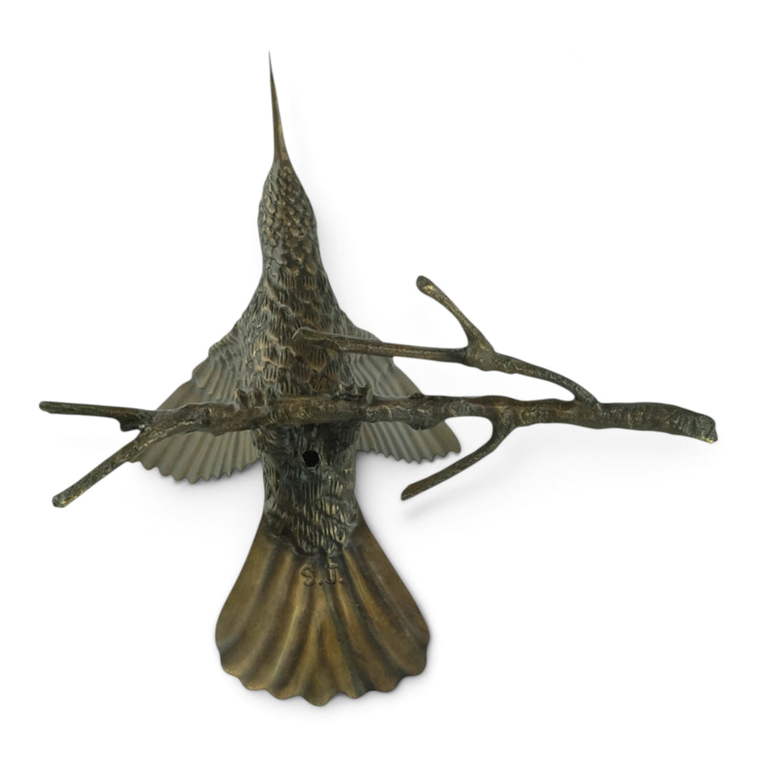 Bronze spiderhunter sculpture