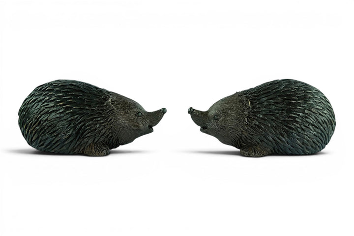 Paar bronzen egel beelden