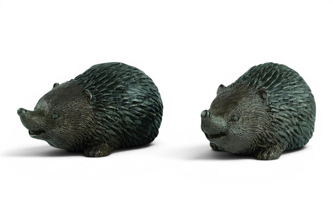 Paar bronzen egel beelden