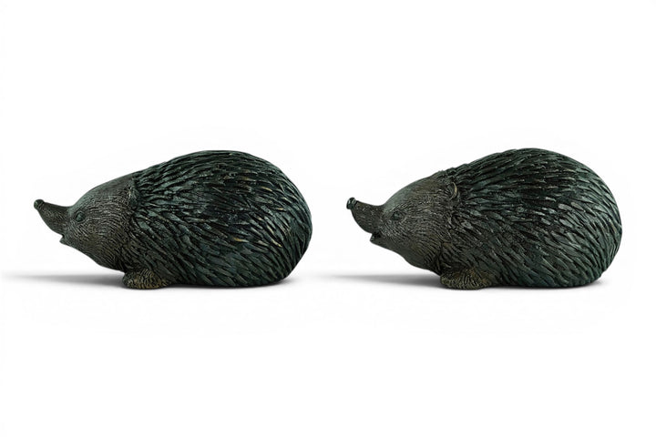 Paar bronzen egel beelden