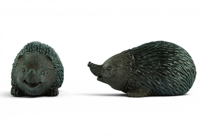 Paar bronzen egel beelden