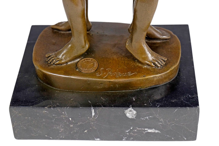 Bronze sculpture of a male couple standing back to back